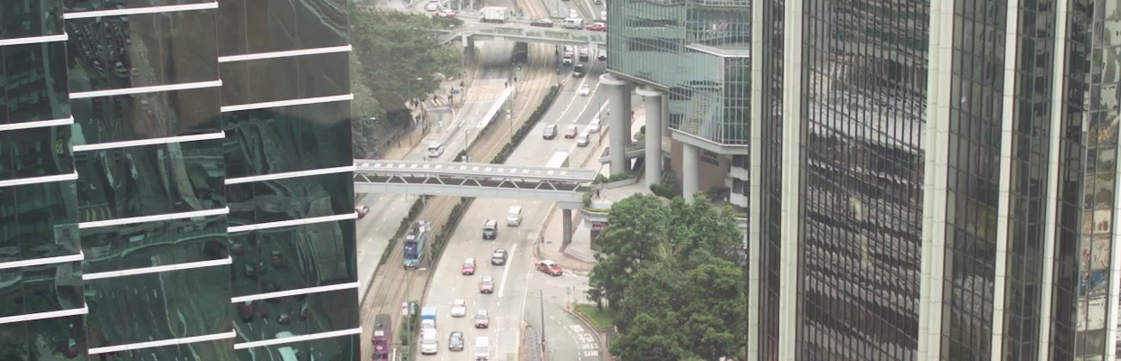 View of traffic in Hong Kong between two buildings
